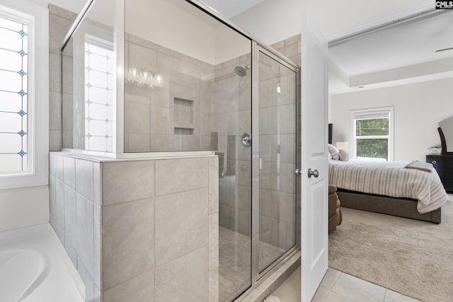 309 Springbrook Way, Chapin, SC 29036 - bathroom featuring connected bathroom, a stall shower, tile patterned flooring, and a bath