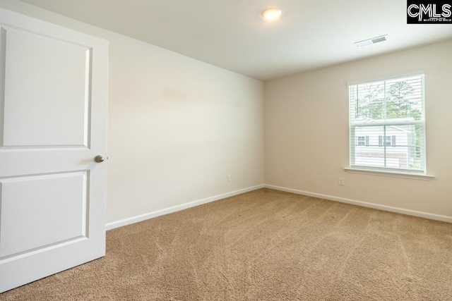 158 Dunham Rd, Columbia, SC 29209 - spare room featuring carpet flooring and baseboards