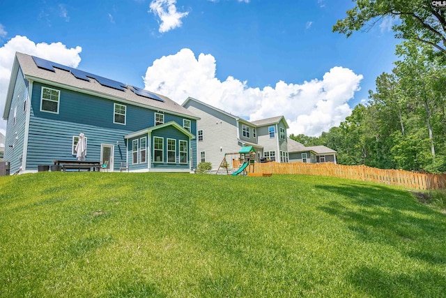 416 Harbour Pointe Dr, Columbia, SC 29229 - rear view of house with a playground and solar panels