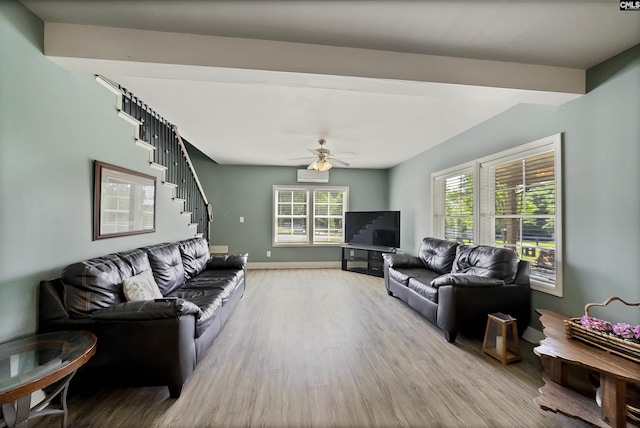 1122 Rawl Rd, Lexington, SC 29072 - living room with light wood-type flooring, stairway, baseboards, and a ceiling fan