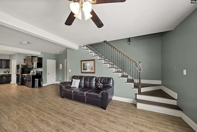 1122 Rawl Rd, Lexington, SC 29072 - living area featuring stairs, wood finished floors, baseboards, and a ceiling fan