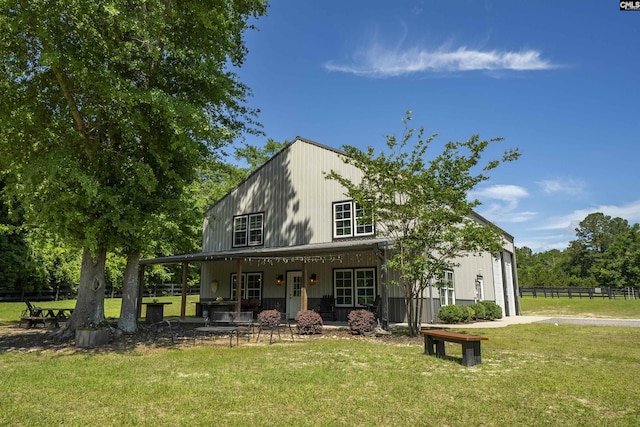 1122 Rawl Rd, Lexington, SC 29072 - rear view of house with covered porch and a garage