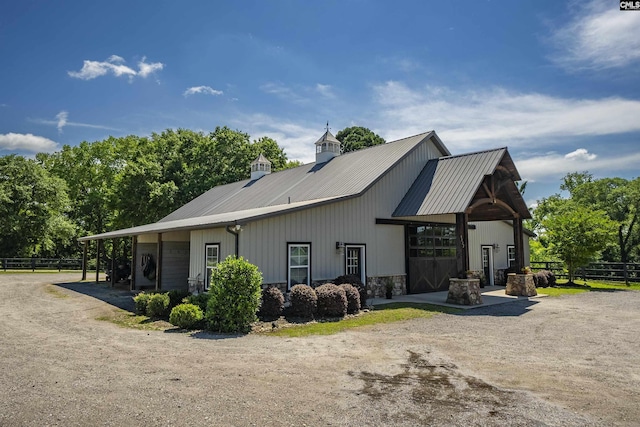 1122 Rawl Rd, Lexington, SC 29072 - back of property with driveway, metal roof, and a carport