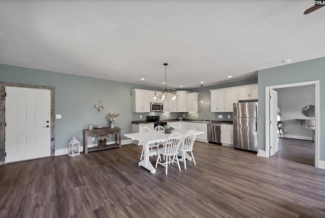 1122 Rawl Rd, Lexington, SC 29072 - dining space with dark wood-type flooring, baseboards, and recessed lighting