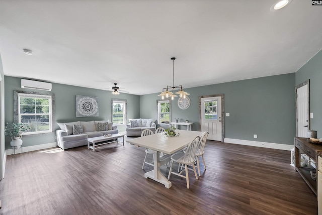 1122 Rawl Rd, Lexington, SC 29072 - dining area featuring a wall mounted AC, baseboards, dark wood-type flooring, and ceiling fan