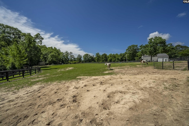 1122 Rawl Rd, Lexington, SC 29072 - view of yard featuring an outbuilding, an enclosed horse arena, a rural view, and an exterior structure