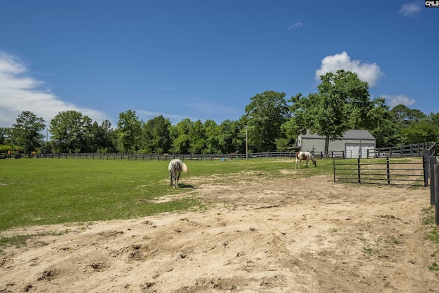 1122 Rawl Rd, Lexington, SC 29072 - view of property's community featuring an enclosed riding area, a rural view, a detached garage, an outbuilding, and an exterior structure