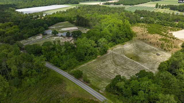 1122 Rawl Rd, Lexington, SC 29072 - aerial overview of property's location with rural landscape, rows of crops, and a heavily wooded area