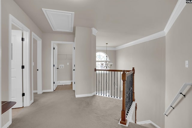 506 Moulton Way W, Columbia, SC 29170 - hall with an upstairs landing, attic access, light colored carpet, baseboards, and ornamental molding