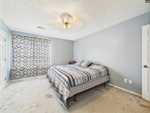 40 Driftwood Ave, Elgin, SC 29045 - carpeted bedroom with a textured ceiling, a ceiling fan, and baseboards