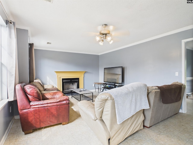 40 Driftwood Ave, Elgin, SC 29045 - living area with ceiling fan, ornamental molding, a fireplace, and baseboards
