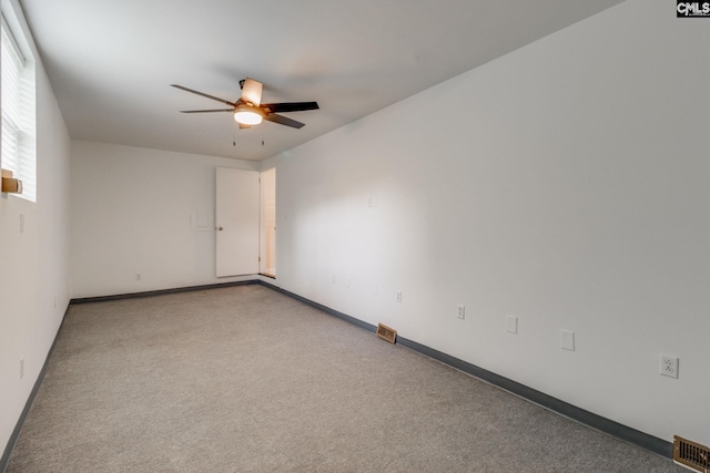 6319 Briarwood Rd, Columbia, SC 29206 - empty room featuring a ceiling fan, baseboards, and carpet flooring