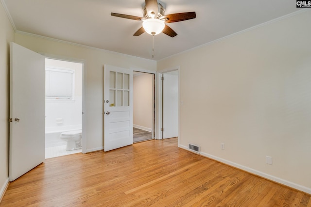 6319 Briarwood Rd, Columbia, SC 29206 - spare room with ceiling fan, light wood-style flooring, crown molding, and baseboards