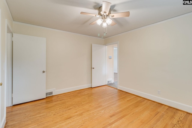 6319 Briarwood Rd, Columbia, SC 29206 - unfurnished room featuring light wood-type flooring, ornamental molding, baseboards, and a ceiling fan