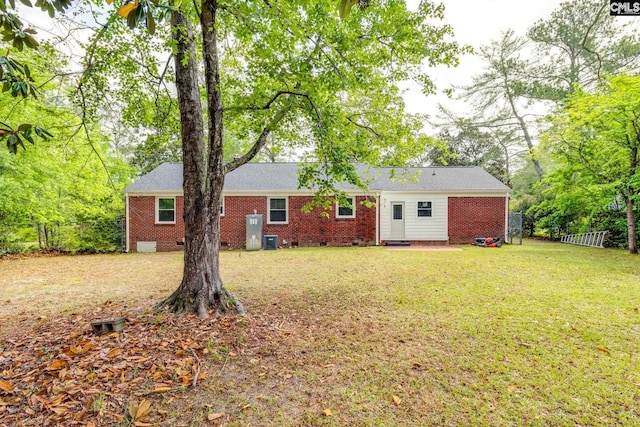 6319 Briarwood Rd, Columbia, SC 29206 - rear view of property with crawl space, central air condition unit, and brick siding