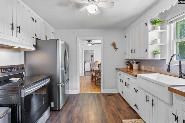 564 Rainbow Cir, West Columbia, SC 29170 - kitchen featuring stainless steel range with electric cooktop, a ceiling fan, under cabinet range hood, a sink, and dark wood finished floors