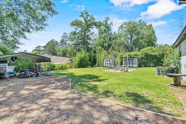 564 Rainbow Cir, West Columbia, SC 29170 - view of grassy yard featuring a detached carport