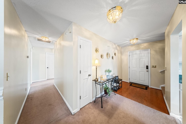 5 Indigo Lake Ct, Columbia, SC 29229 - carpeted entryway with baseboards and a textured ceiling