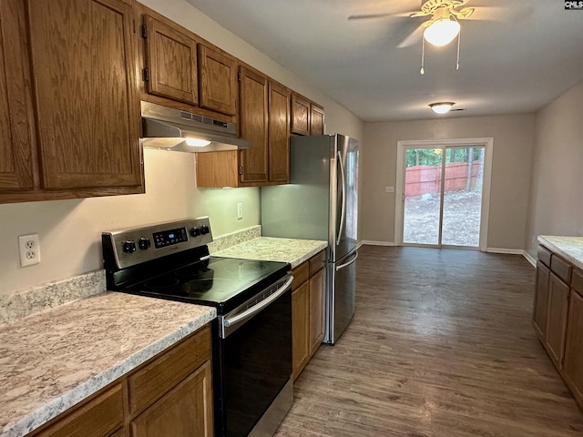 26 Someton Ct, Irmo, SC 29063 - kitchen featuring appliances with stainless steel finishes, under cabinet range hood, light countertops, and wood finished floors
