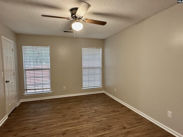 26 Someton Ct, Irmo, SC 29063 - unfurnished room with dark wood finished floors, ceiling fan, a textured ceiling, and baseboards