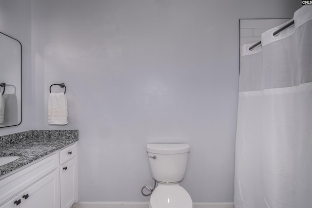 615 Laurel Hill Ln, Columbia, SC 29201 - bathroom with vanity, toilet, baseboards, and a shower with shower curtain