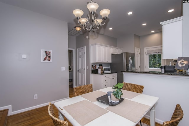 615 Laurel Hill Ln, Columbia, SC 29201 - dining space featuring baseboards, dark wood-style flooring, a chandelier, and recessed lighting