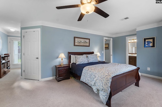 1130 Coatesdale Rd, Columbia, SC 29209 - carpeted bedroom featuring crown molding, baseboards, a ceiling fan, and ensuite bathroom