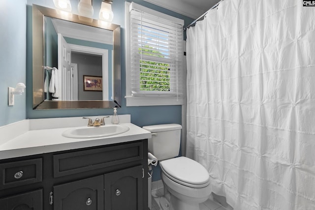 1130 Coatesdale Rd, Columbia, SC 29209 - full bathroom with vanity, toilet, and tile patterned flooring