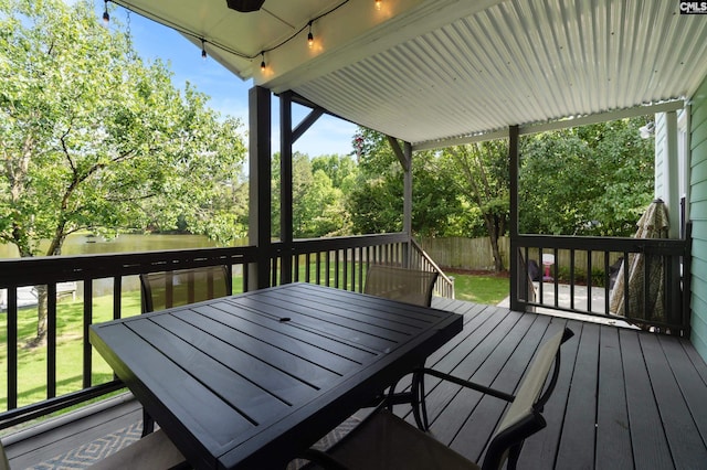 1130 Coatesdale Rd, Columbia, SC 29209 - deck featuring a water view, view of scattered trees, and outdoor dining space