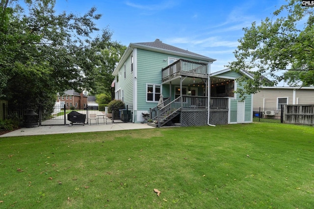 1130 Coatesdale Rd, Columbia, SC 29209 - back of property with a gate, a patio, stairs, and a deck