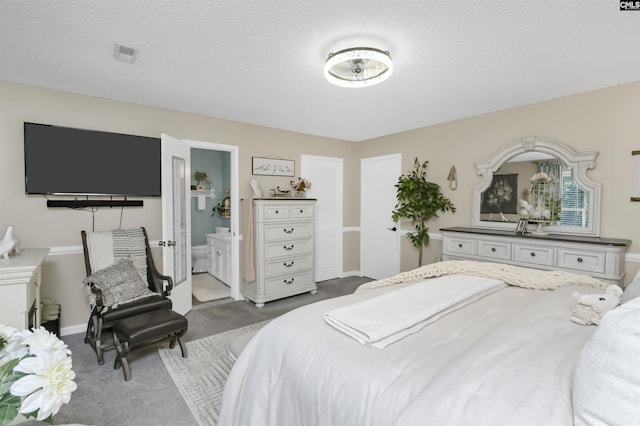 213 Windwood Dr, Elgin, SC 29045 - bedroom featuring carpet, connected bathroom, baseboards, and a textured ceiling