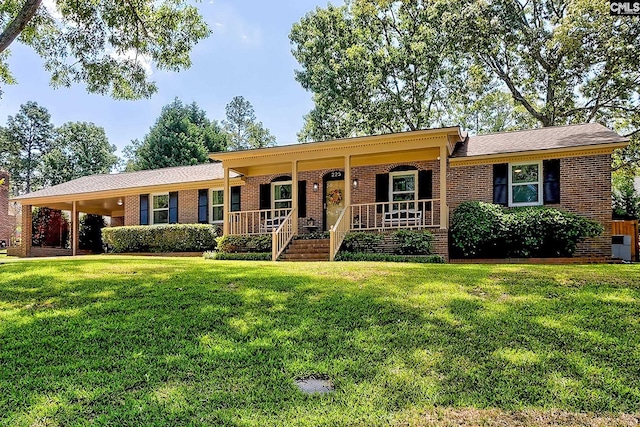 225 King Charles Rd, Columbia, SC 29209 - ranch-style house featuring brick siding, a front lawn, and a porch