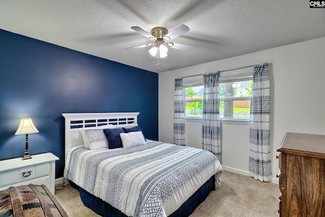 225 King Charles Rd, Columbia, SC 29209 - bedroom with carpet floors, baseboards, a ceiling fan, and a textured ceiling