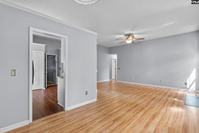 140 Whispering Glen Cir, West Columbia, SC 29170 - empty room featuring wood finished floors, a ceiling fan, baseboards, and a textured ceiling