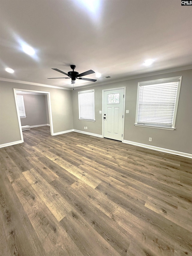 227 Flora Dr, Columbia, SC 29223 - entryway with ornamental molding, a ceiling fan, baseboards, and dark wood-style floors