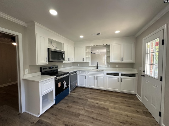 227 Flora Dr, Columbia, SC 29223 - kitchen featuring open shelves, stainless steel appliances, crown molding, a sink, and white cabinetry