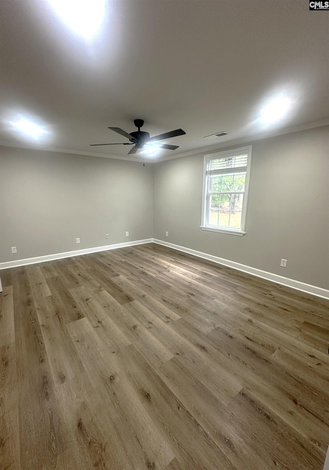 227 Flora Dr, Columbia, SC 29223 - empty room featuring wood finished floors, baseboards, and ceiling fan