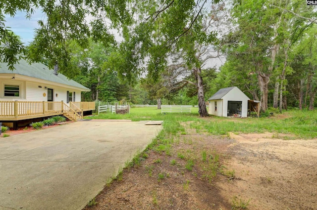 1091 Nick Watts Rd, Lugoff, SC 29078 - view of yard featuring a deck and an outbuilding