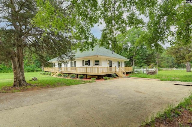 1091 Nick Watts Rd, Lugoff, SC 29078 - view of front of property with a wooden deck, a front lawn, and driveway