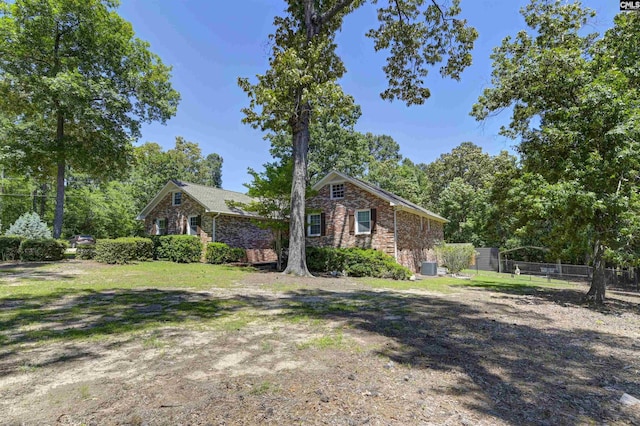 340 Dutchman Shores Cir, Chapin, SC 29036 - view of property exterior featuring brick siding and central AC unit