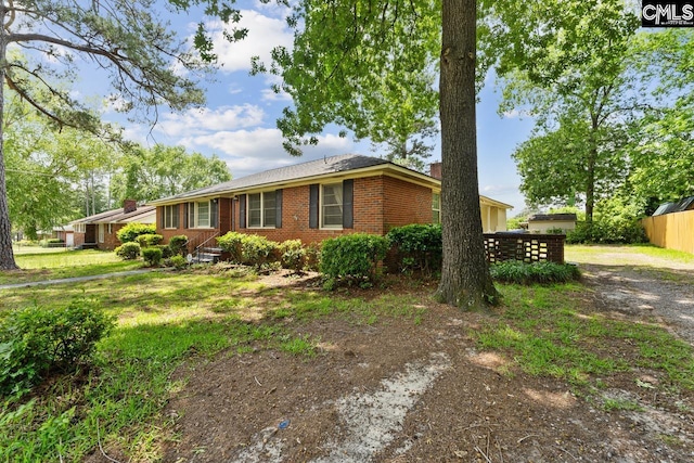 200 Shady Ln, Cayce, SC 29033 - ranch-style house with brick siding and a chimney