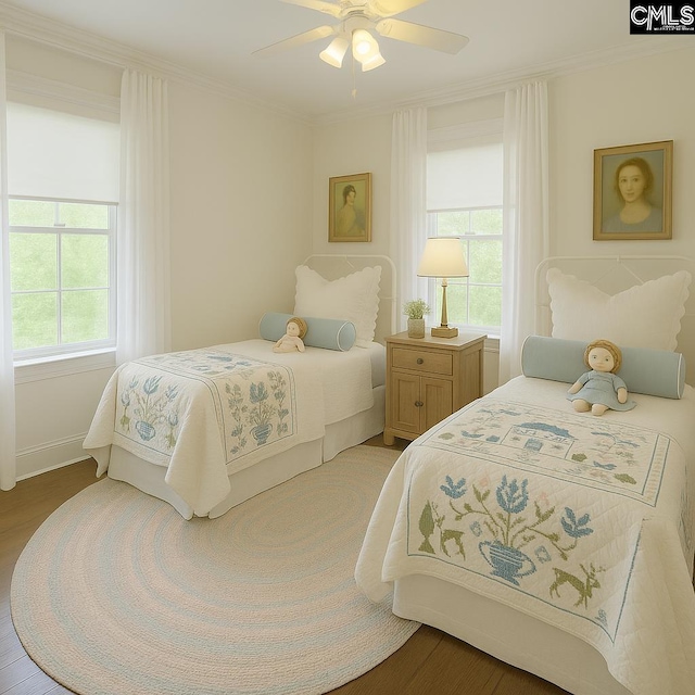 2336 Park St, Columbia, SC 29201 - bedroom with crown molding, wood finished floors, and a ceiling fan