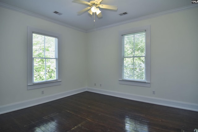 2336 Park St, Columbia, SC 29201 - spare room with dark wood-style floors, plenty of natural light, ornamental molding, and ceiling fan