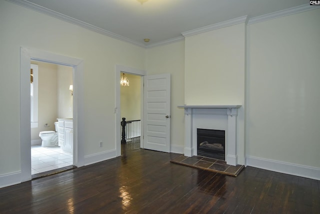 2336 Park St, Columbia, SC 29201 - unfurnished living room with hardwood / wood-style floors, crown molding, a fireplace, and baseboards