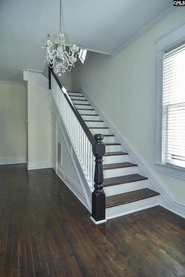 2336 Park St, Columbia, SC 29201 - stairway with hardwood / wood-style flooring, a chandelier, baseboards, and ornamental molding