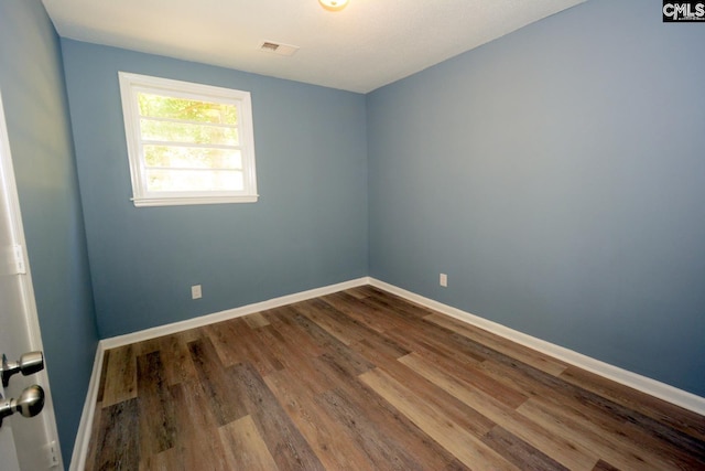4257 Donavan Dr, Columbia, SC 29210 - empty room featuring dark wood-style floors and baseboards