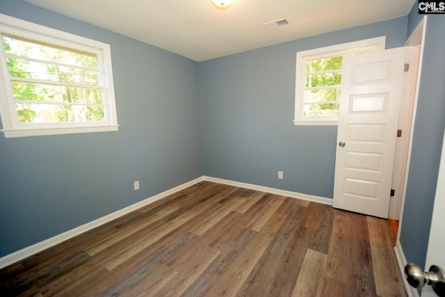 4257 Donavan Dr, Columbia, SC 29210 - empty room with wood finished floors and baseboards