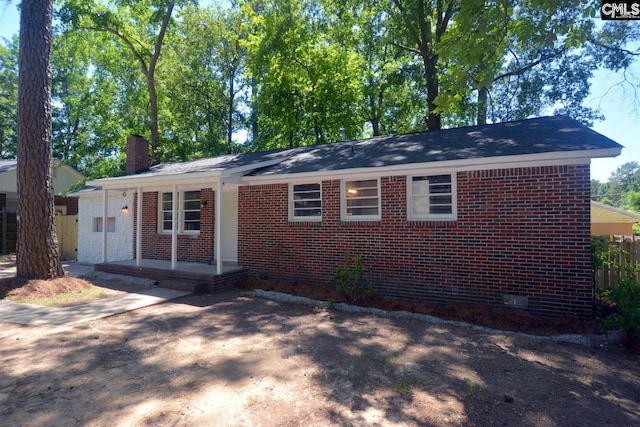 4257 Donavan Dr, Columbia, SC 29210 - ranch-style home with a chimney, crawl space, brick siding, and covered porch