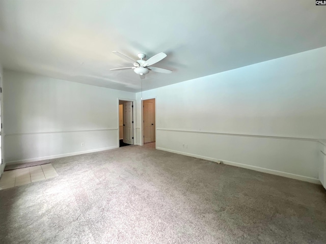 117 Fire Thorn Ln, Columbia, SC 29223 - spare room featuring a ceiling fan, carpet flooring, and baseboards