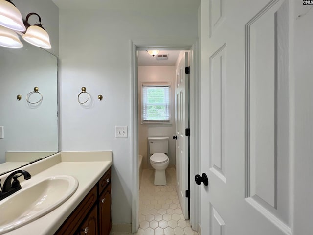 117 Fire Thorn Ln, Columbia, SC 29223 - bathroom featuring tile patterned flooring, vanity, and toilet
